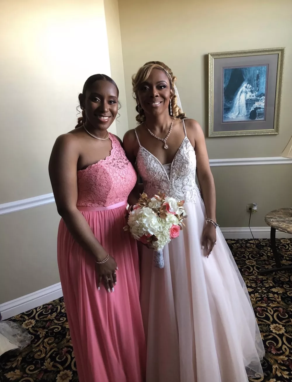 Ashely and Dominique in wedding attire